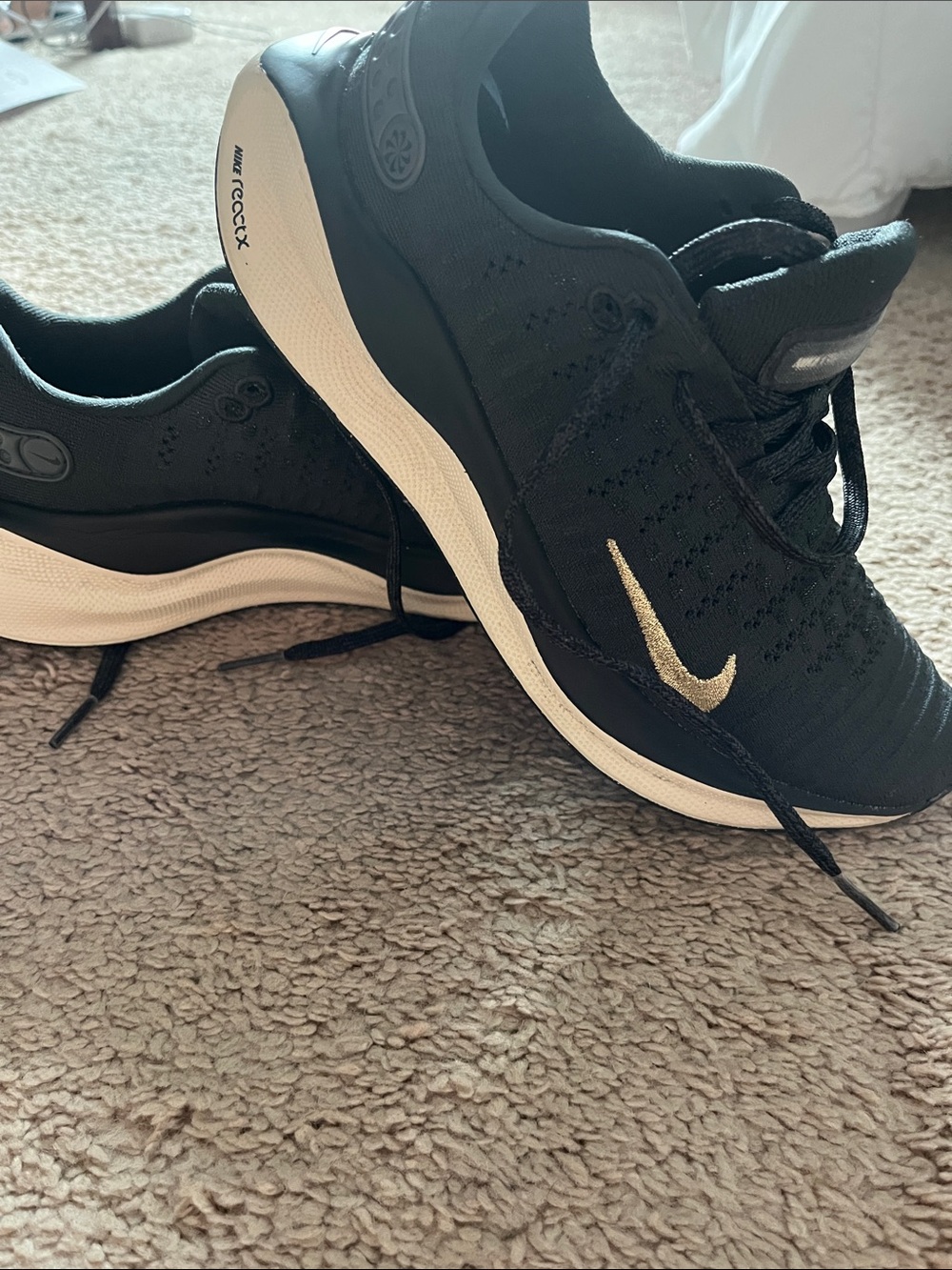 Nike women’s 6 Black Low-Top Sneakers with Cream Sole
